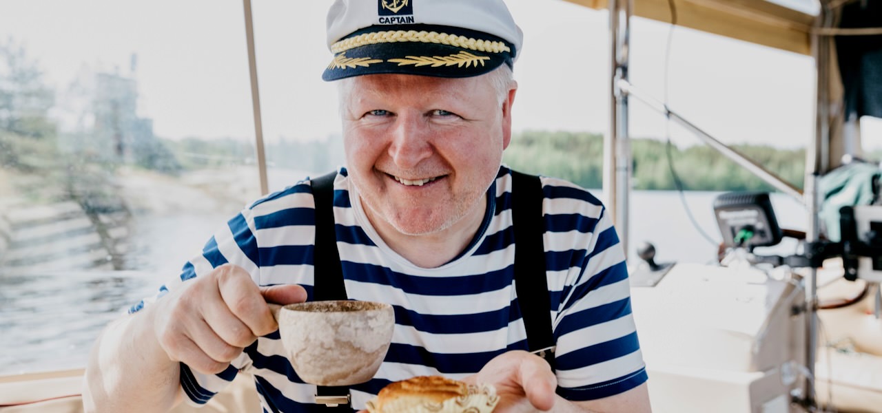 happy finn Arto on a cruise having coffee break.